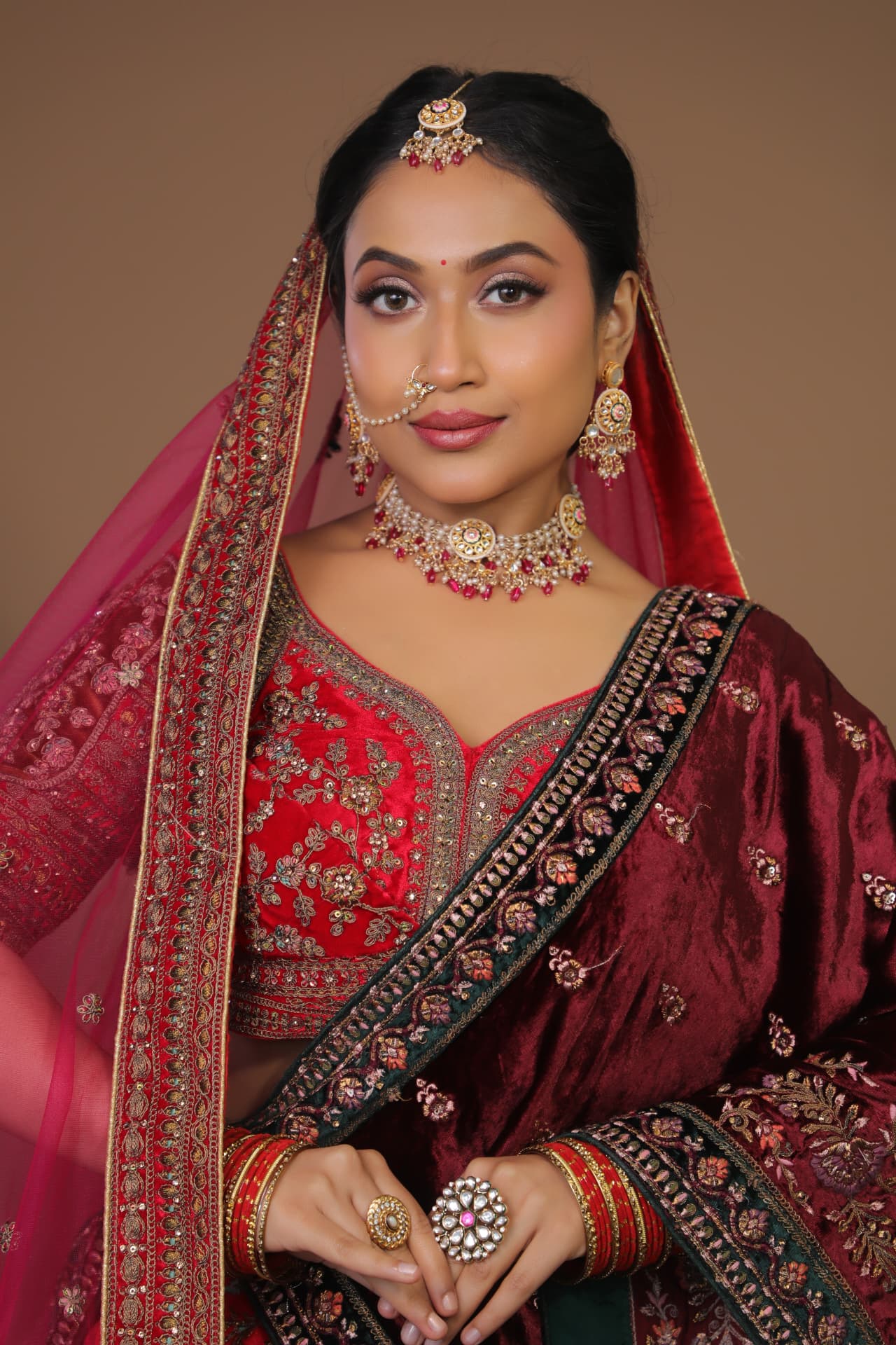 North Indian red lehenga bridal makeup look