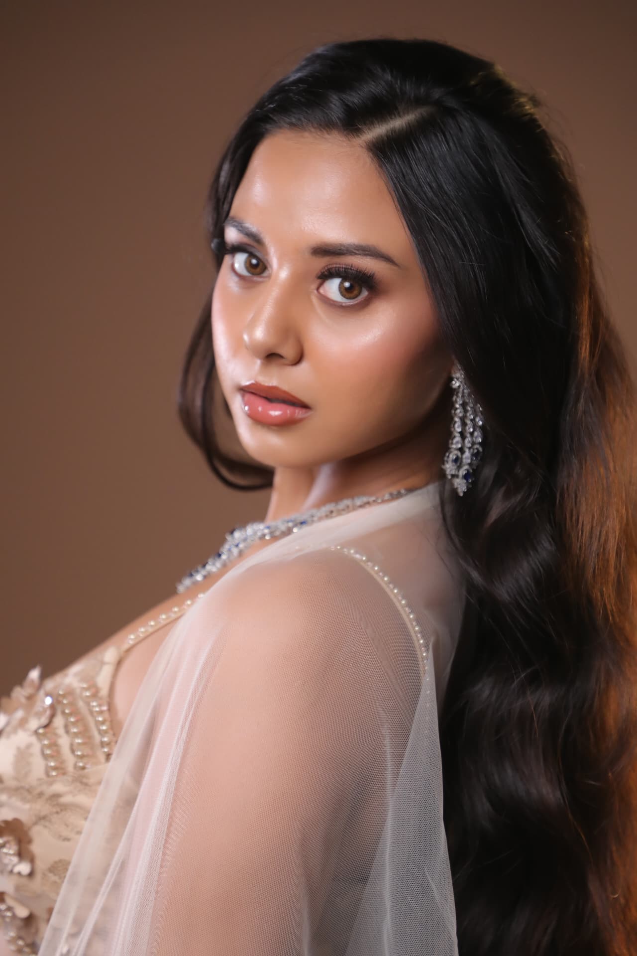 Soft glam reception makeup with glossy skin finish